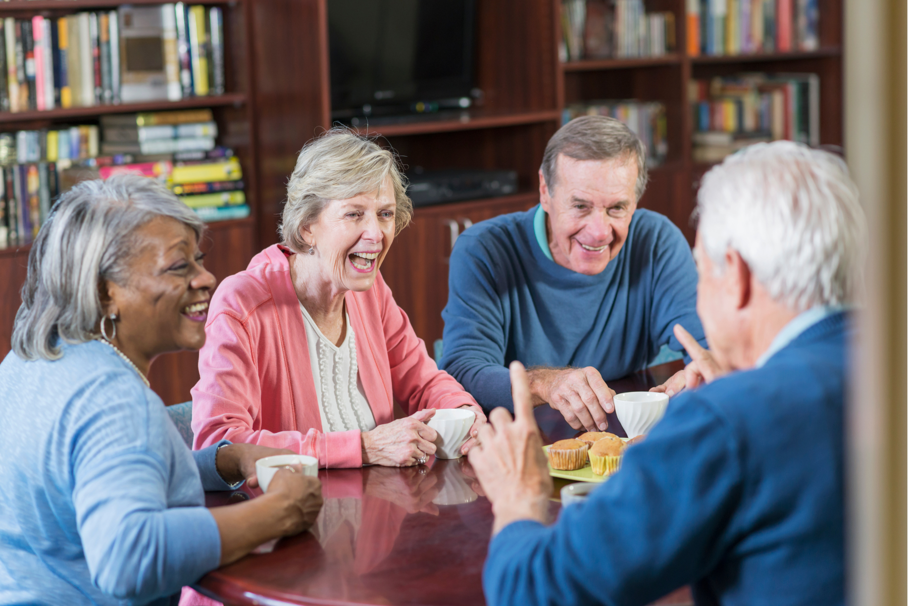 group of seniors together at a table