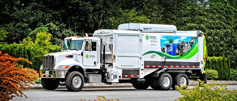 white recycle truck with the logo emterra