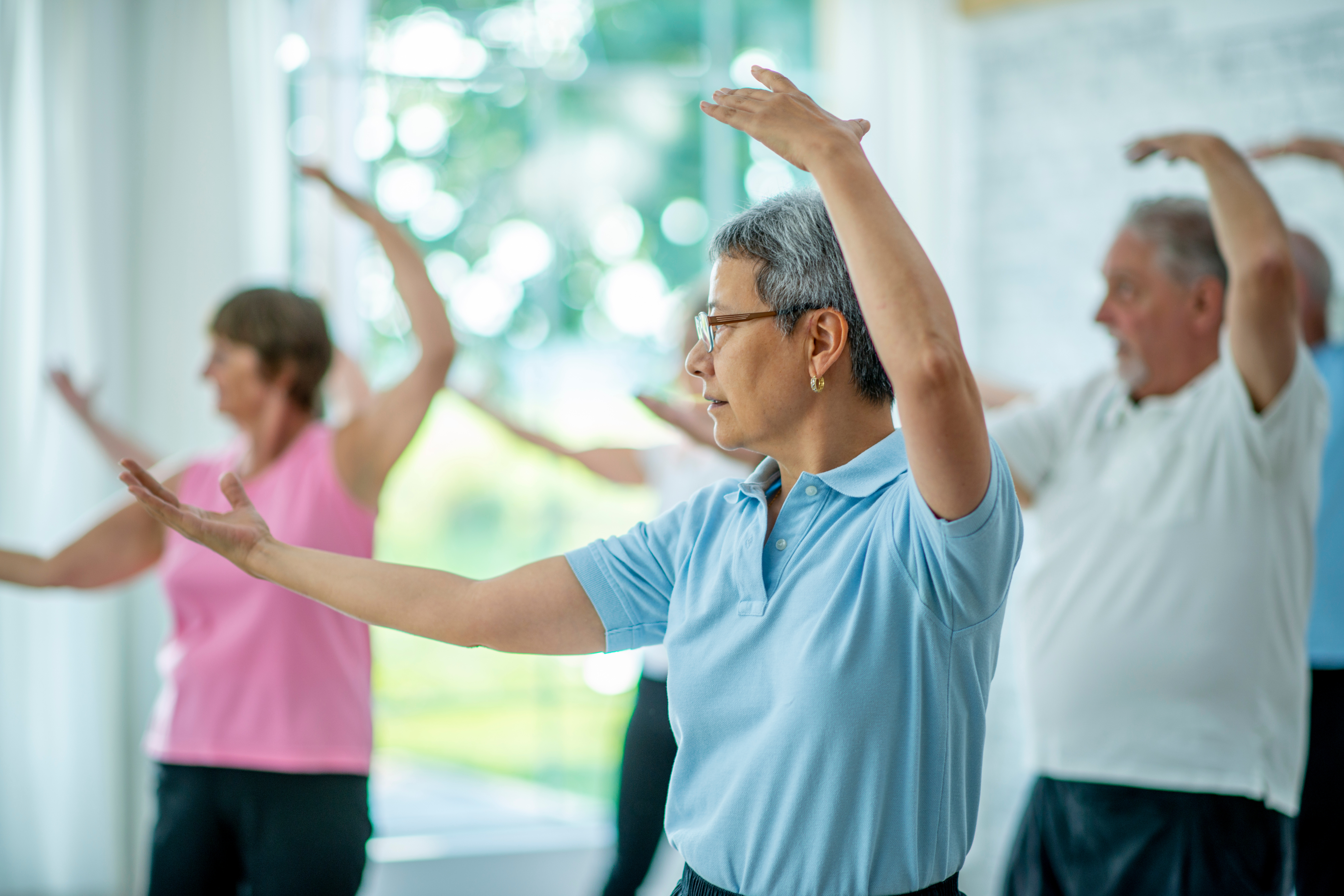 seniors practicing tai chi