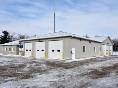 Fire station building with 3 garage bay doors