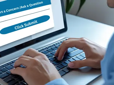 Hands typing on a laptop with the words Report a Concern/Ask A Question and a rectangle below with the words click to submit