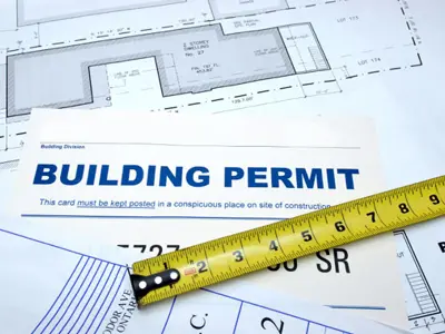 building design drawing with a ruler and the word building permit