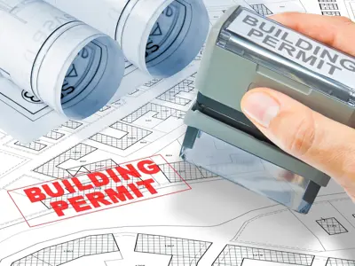building design drawing with a stamp and the word building permit